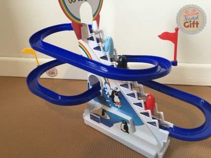 Circuit de pingouins avec escalier mécanique