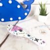 Petite brosse à cheveux style années 80