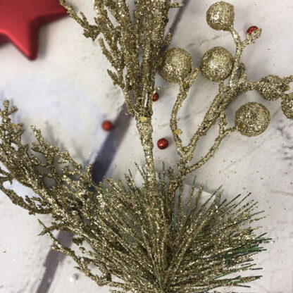 Décoration de Noël - Branche recouverte de paillettes dorées