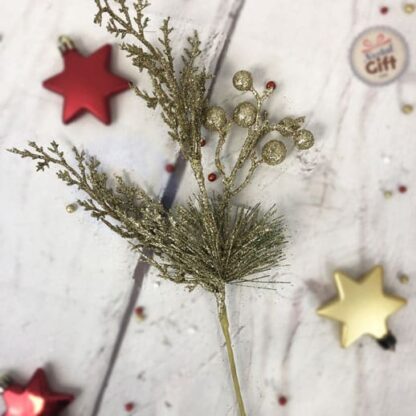Décoration de Noël - Branche recouverte de paillettes dorées