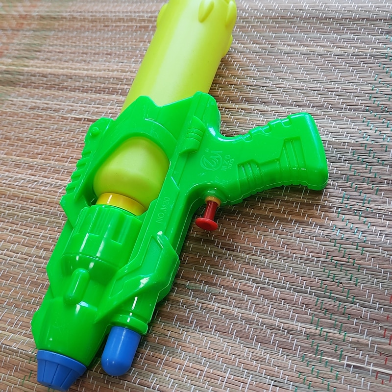 mini pistolets à eau 4 pièces - pistolet à eau - 3 ans + - bleu rose vert  jaune