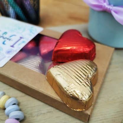 Cœurs "Merci nounou" au chocolat au lait et chocolat noir praliné - Collection arc-en-ciel
