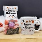 Mug et bonbons Halloween acidulés - Tarentules noires, dentiers et guimauves citrouille et tête de mort