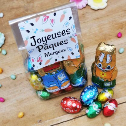 Sachet "Joyeuses Pâques" personnalisé - 10 Oeufs pralinés, 10 oeufs croustillants et 2 lapins en chocolat (25g)